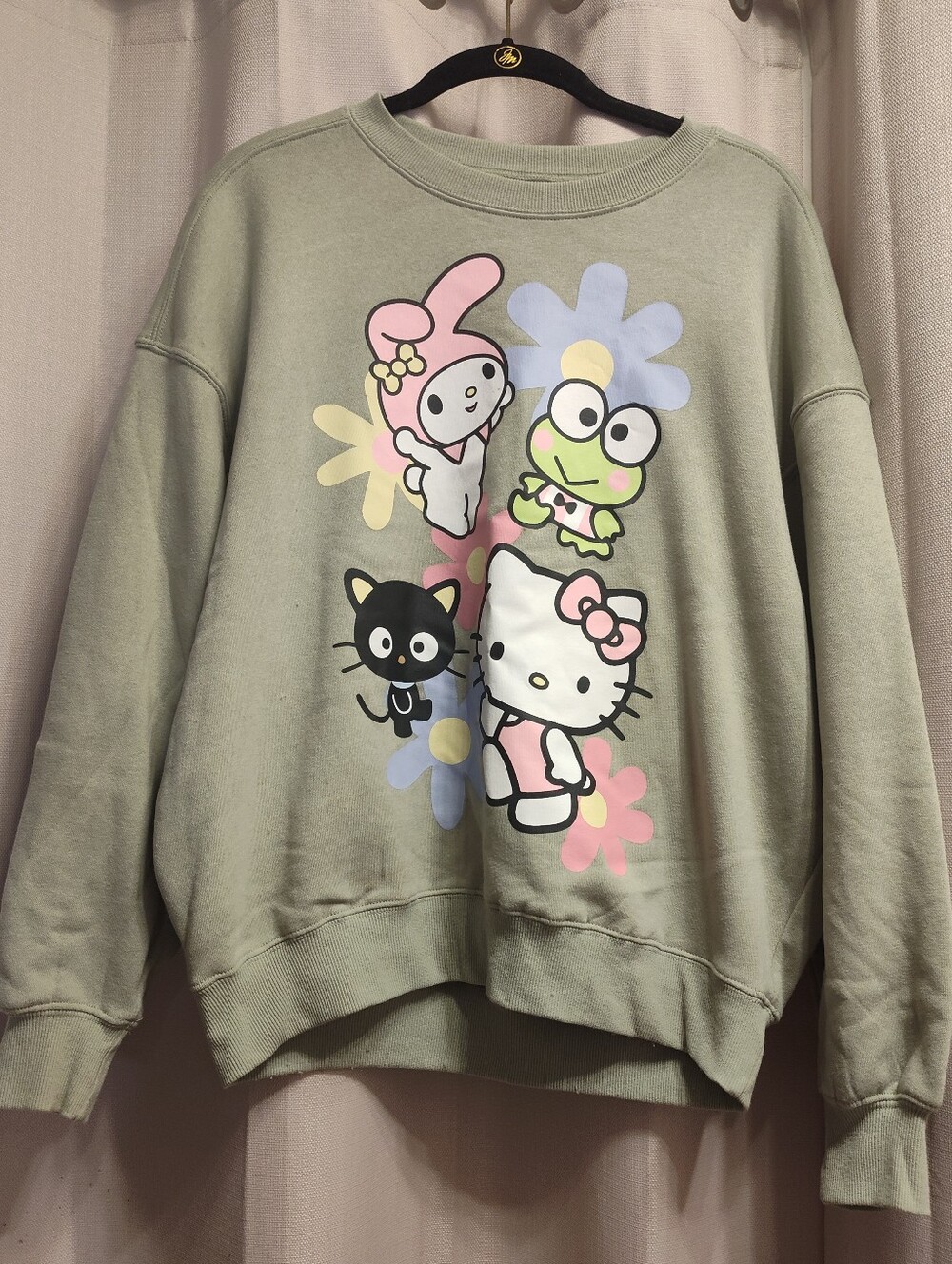 Sanrio Hello Kitty And Friends Crewneck Sweatshirt With Graphic Of Hello Kitty.